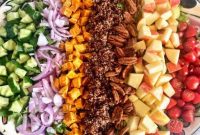 Autumn Harvest Salad with Roasted Squash, Apples & Cranberries