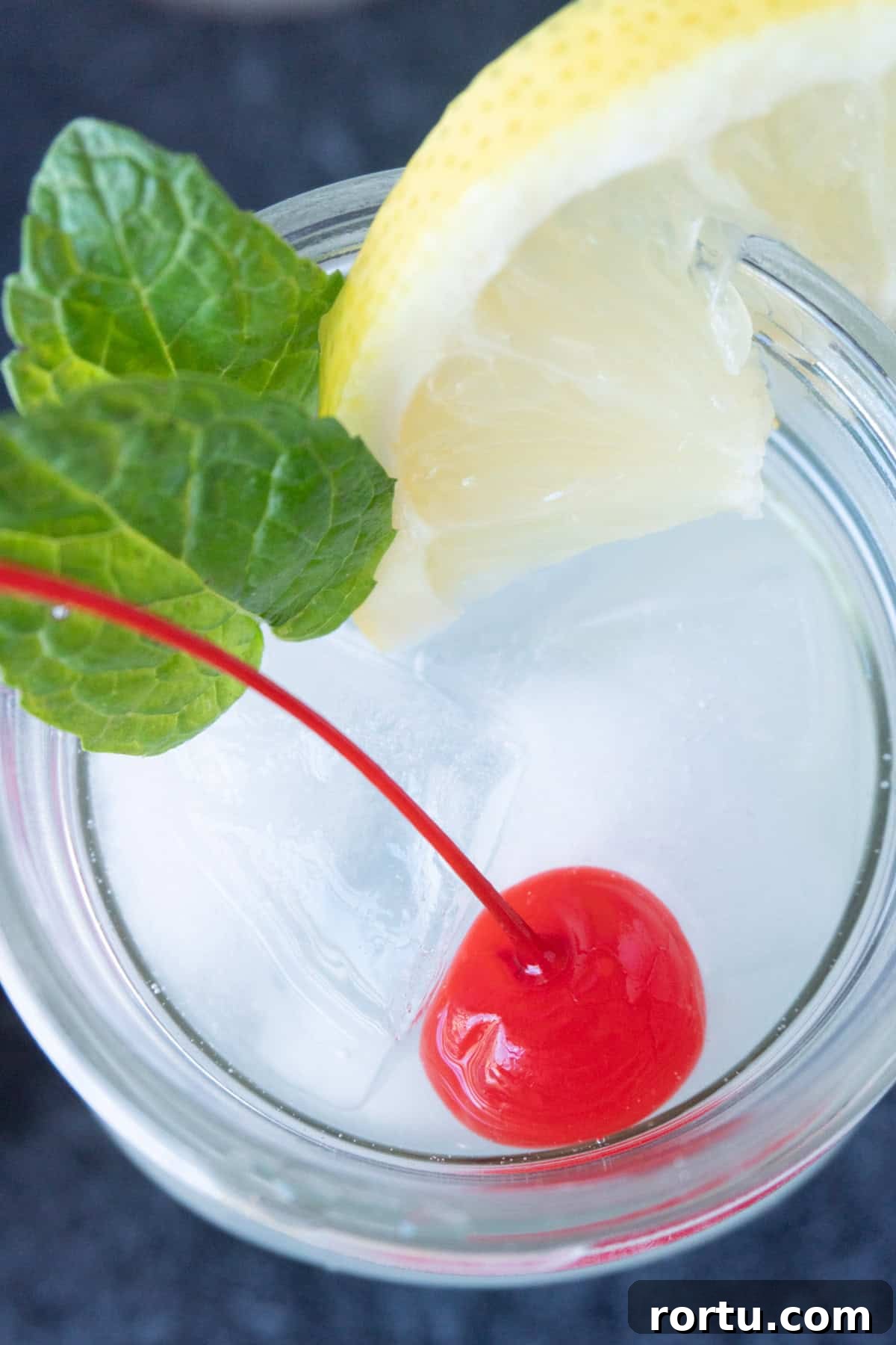 looking down on glass with non-alcoholic mint julep in it