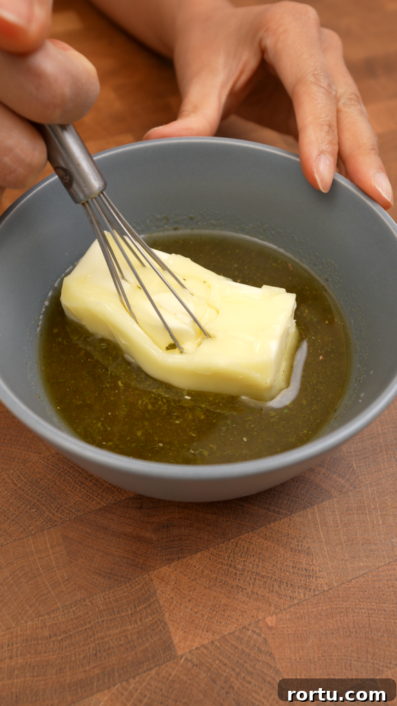Homemade Instant Garlic Spread Recipe for Bread & Dips 7 whisking butter into mixture
