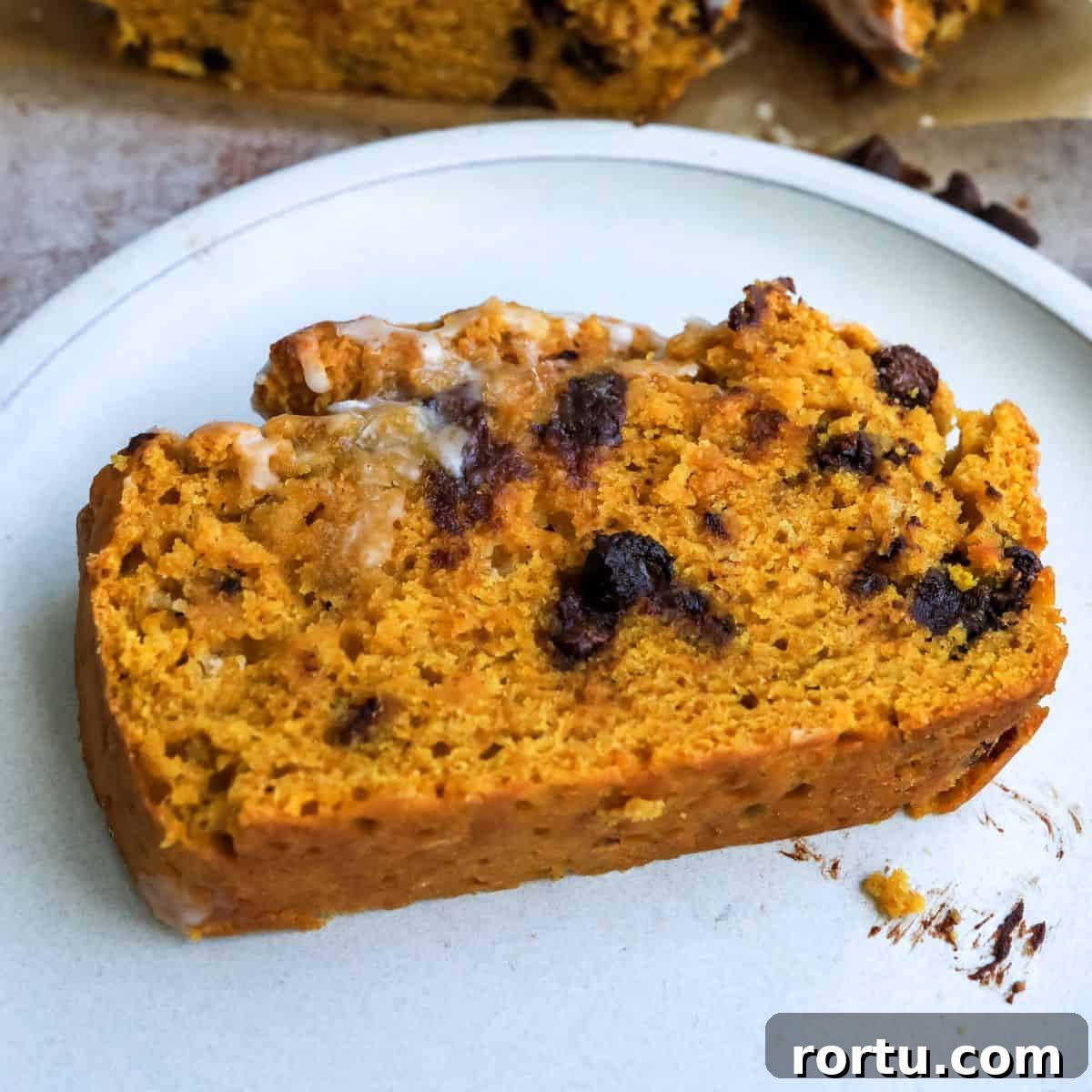 Easy Pumpkin Bread  on a white plate.
