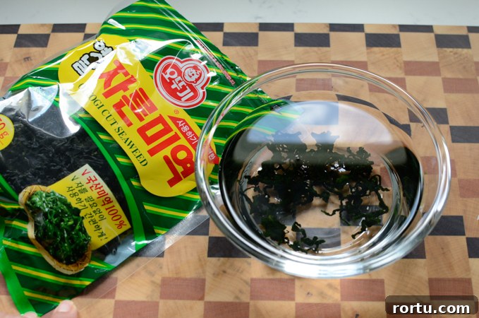 Dried seaweed in a bowl of water.