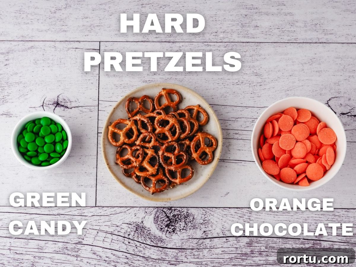 Ingredients: green candy, hard pretzels, orange chocolate.