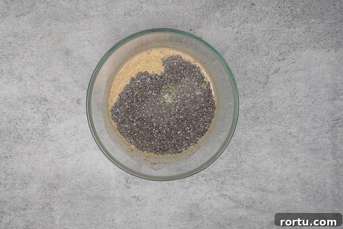 Chia seeds added to the bowl.