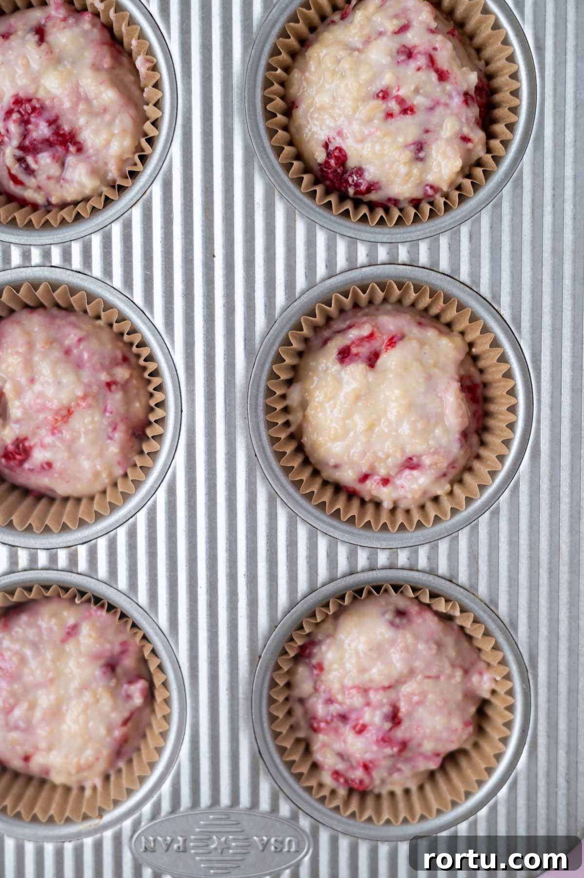 Lemon Raspberry Cupcakes Made from Scratch: Bright Summer Recipe 8 batter in muffin liners in a pan