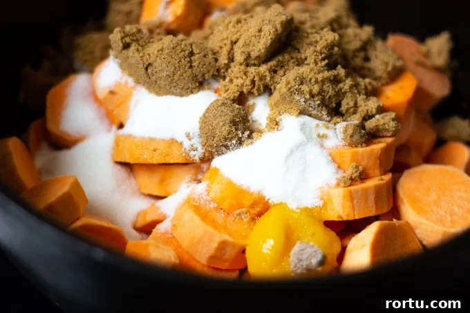 Southern Candied Yams Recipe with Video — Classic Southern Side Dish 4 Candied yams ingredients in a pot on on the stovetop