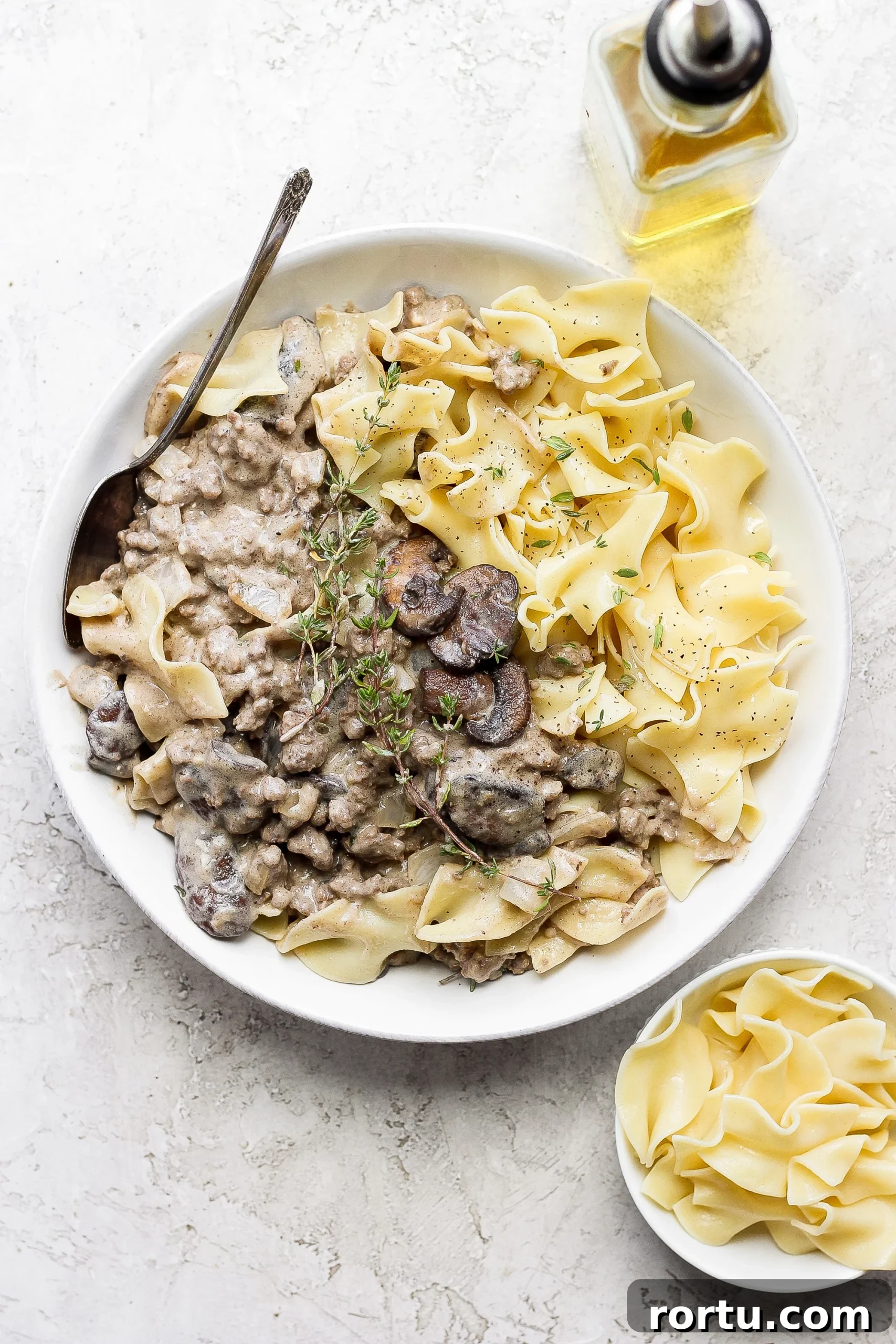 Ground beef stroganoff ground beef stroganoff in a bowl topped with fresh thyme