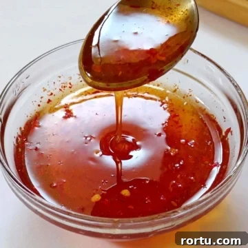 Image showing hot honey sauce in a glass bowl.