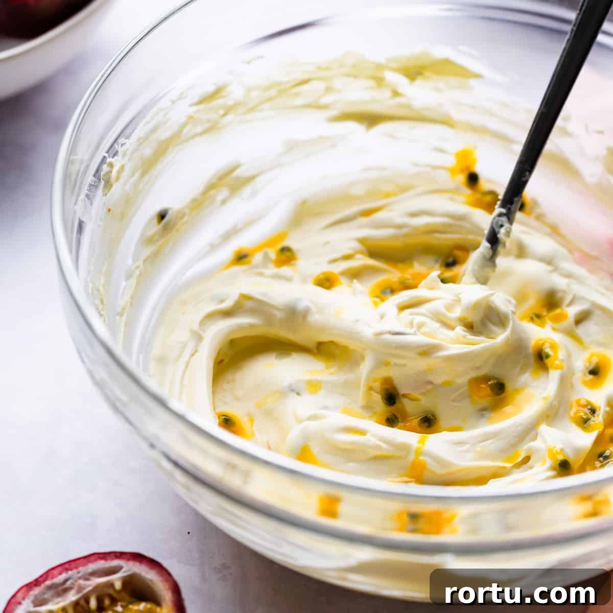 Lemon Mascarpone Tart Recipe — Creamy Citrus Dessert 4 bowl with whipped mascarpone cheese and passion fruit seeds.