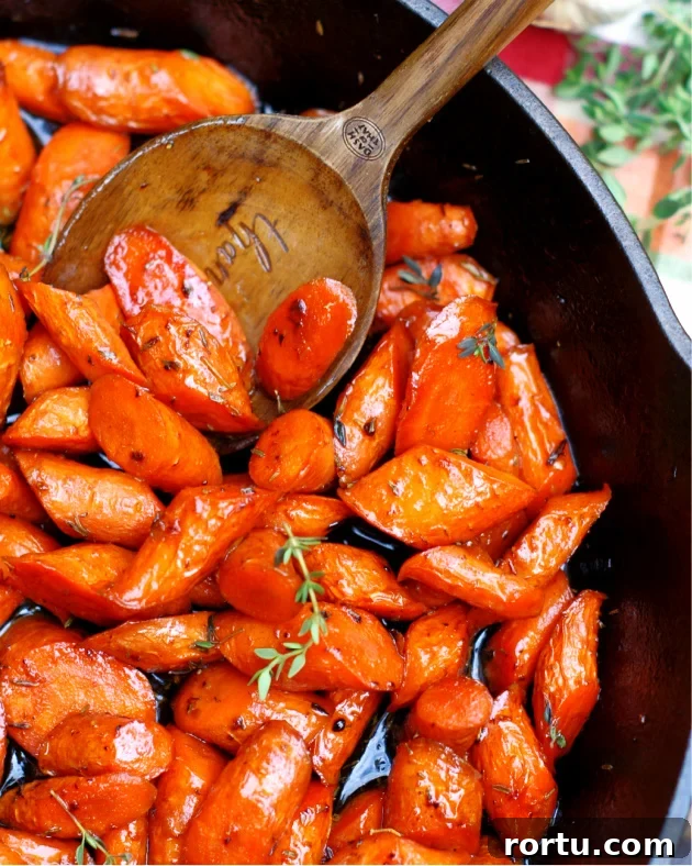 Garlic-Honey Glazed Carrots Recipe for Sweet Savory Side Dish 4 Honey Glazed Garlic Butter Carrots in a skillet