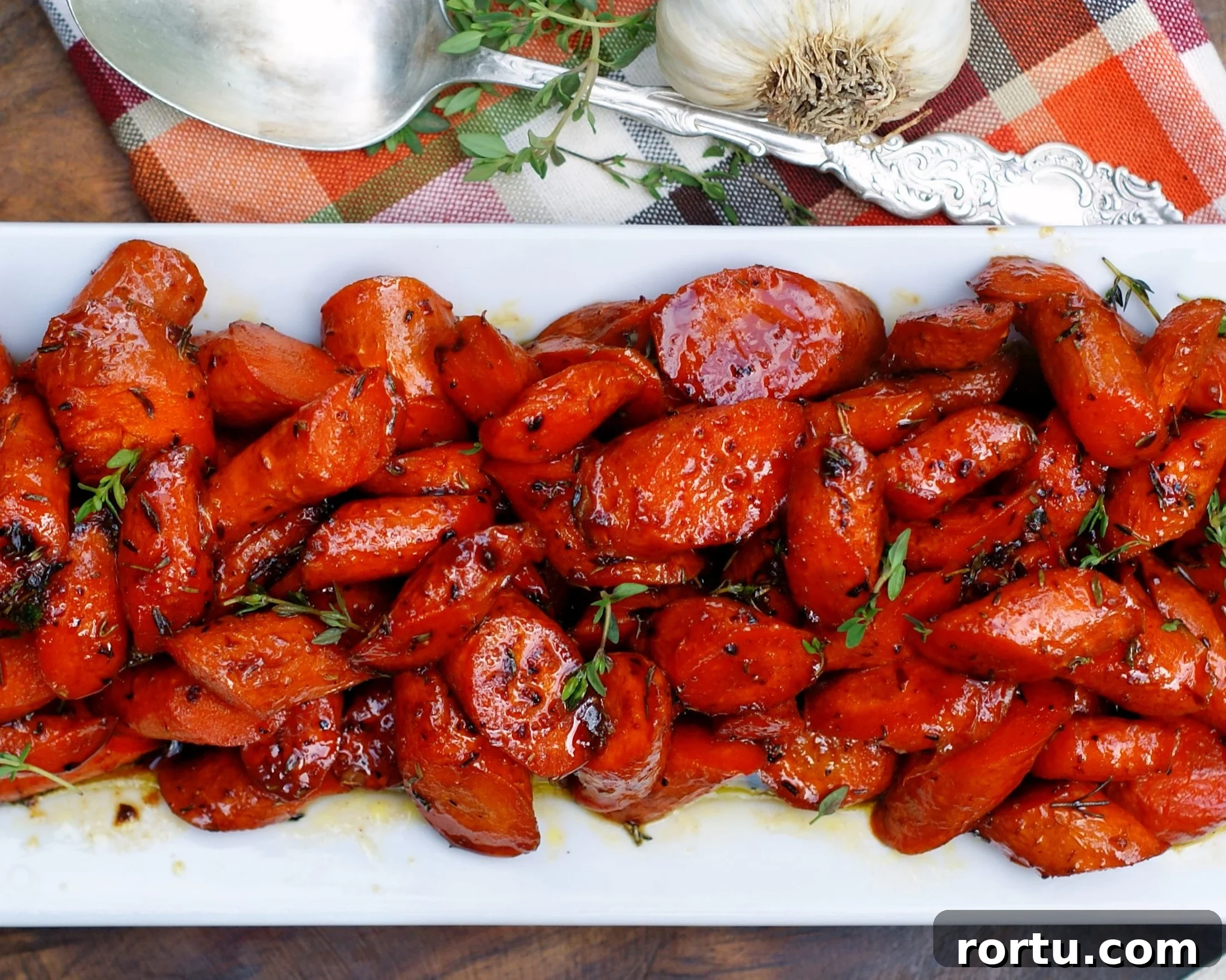 Garlic-Honey Glazed Carrots Recipe for Sweet Savory Side Dish 5 Serving platter of Honey Glazed Carrots