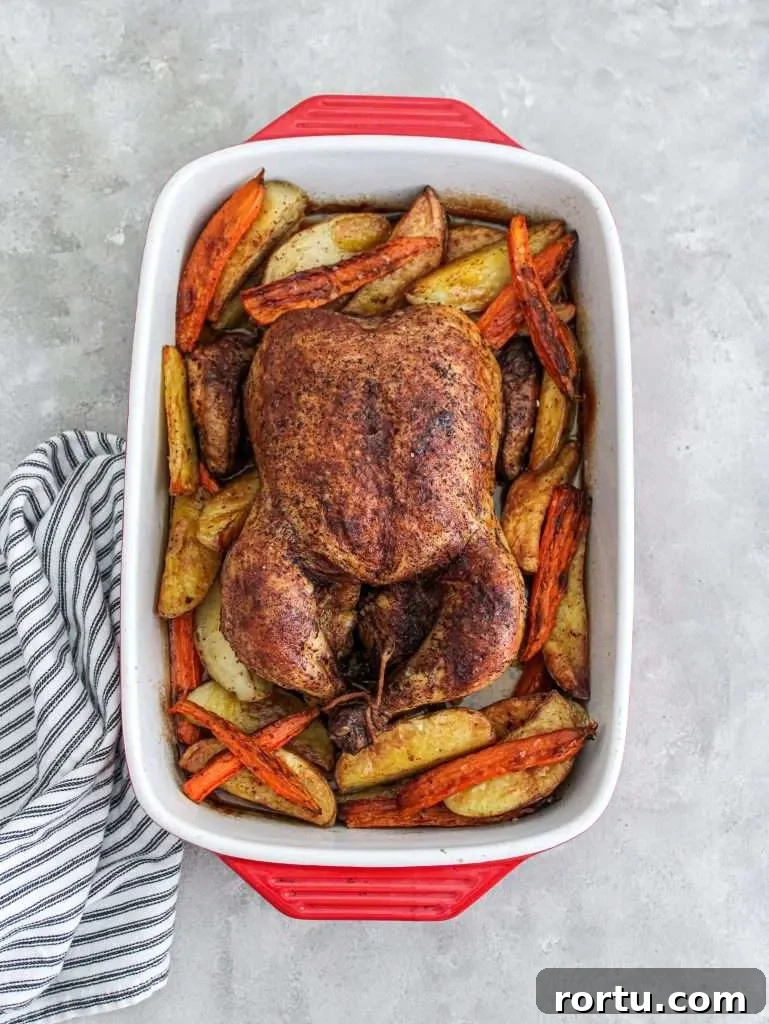 fall spice roasted chicken roasted in baking dish