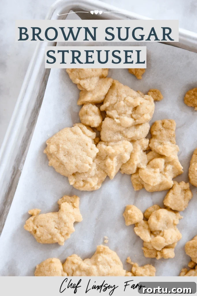 Perfect Streusel Topping Recipe for Crispy, Buttery Crumbles 7 Brown sugar streusel on parchment paper.