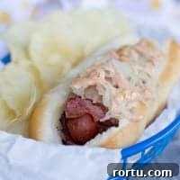 Pastrami Wrapped Hot Dog in a basket.