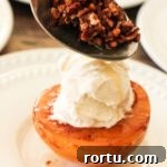 topping caramelized peaches with toasted pecans