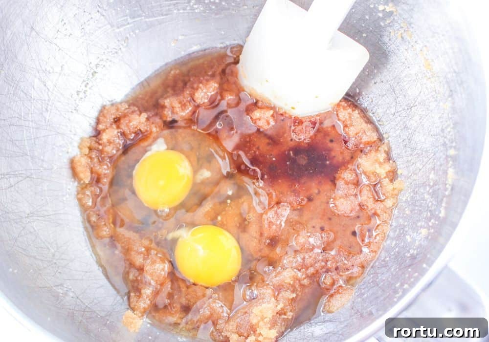 Chocolate Chip Cookies Without Butter — Made with Oil 7 two eggs added to the sugar and oil mixture in the mixing bowl