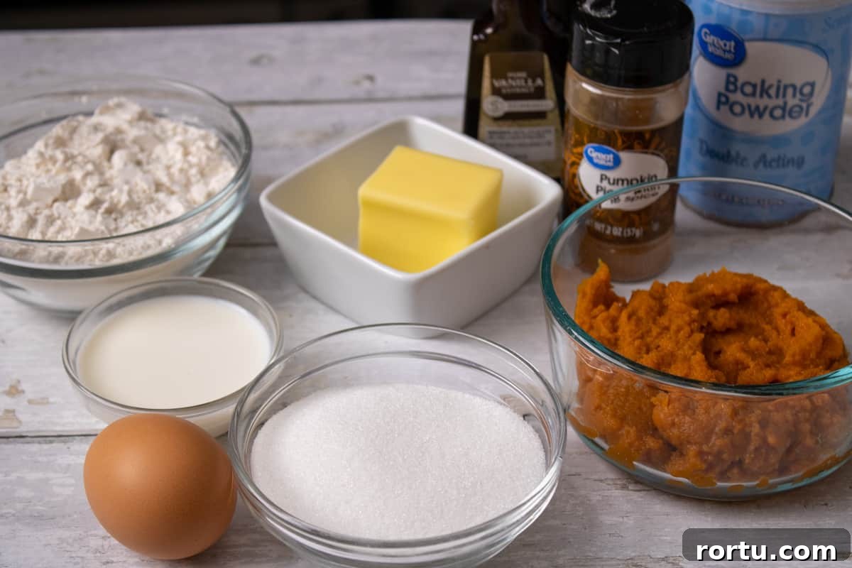 The ingredients needed to make pumpkin donut muffins.