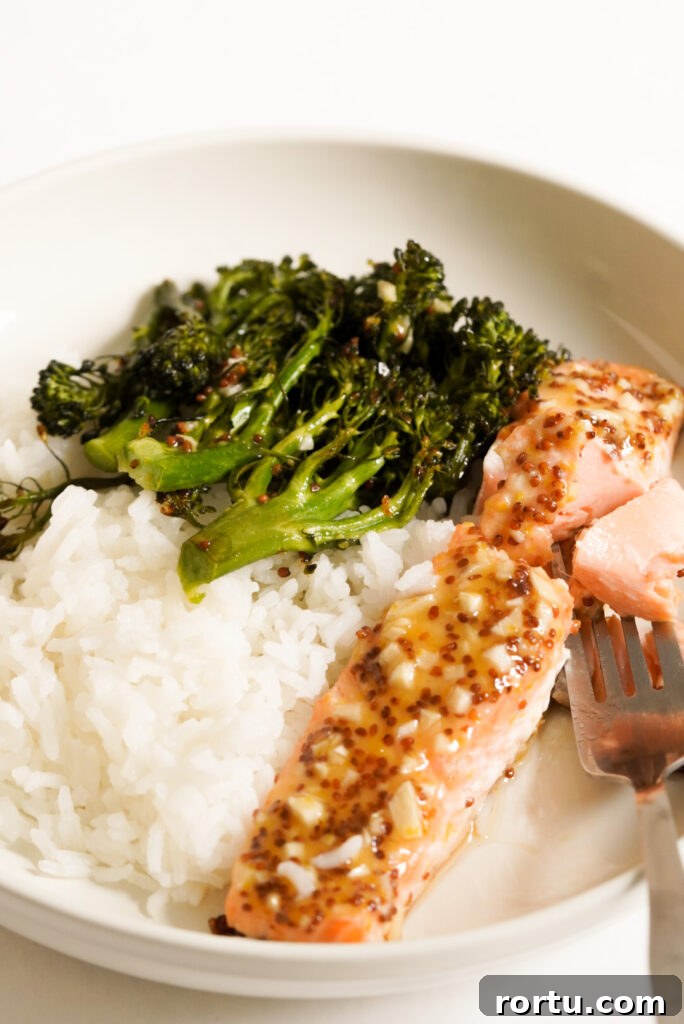 Maple Mustard Baked Salmon Recipe for Tender Glazed Fillets 3 plate of maple glazed mustard salmon, white rice, and broccoli