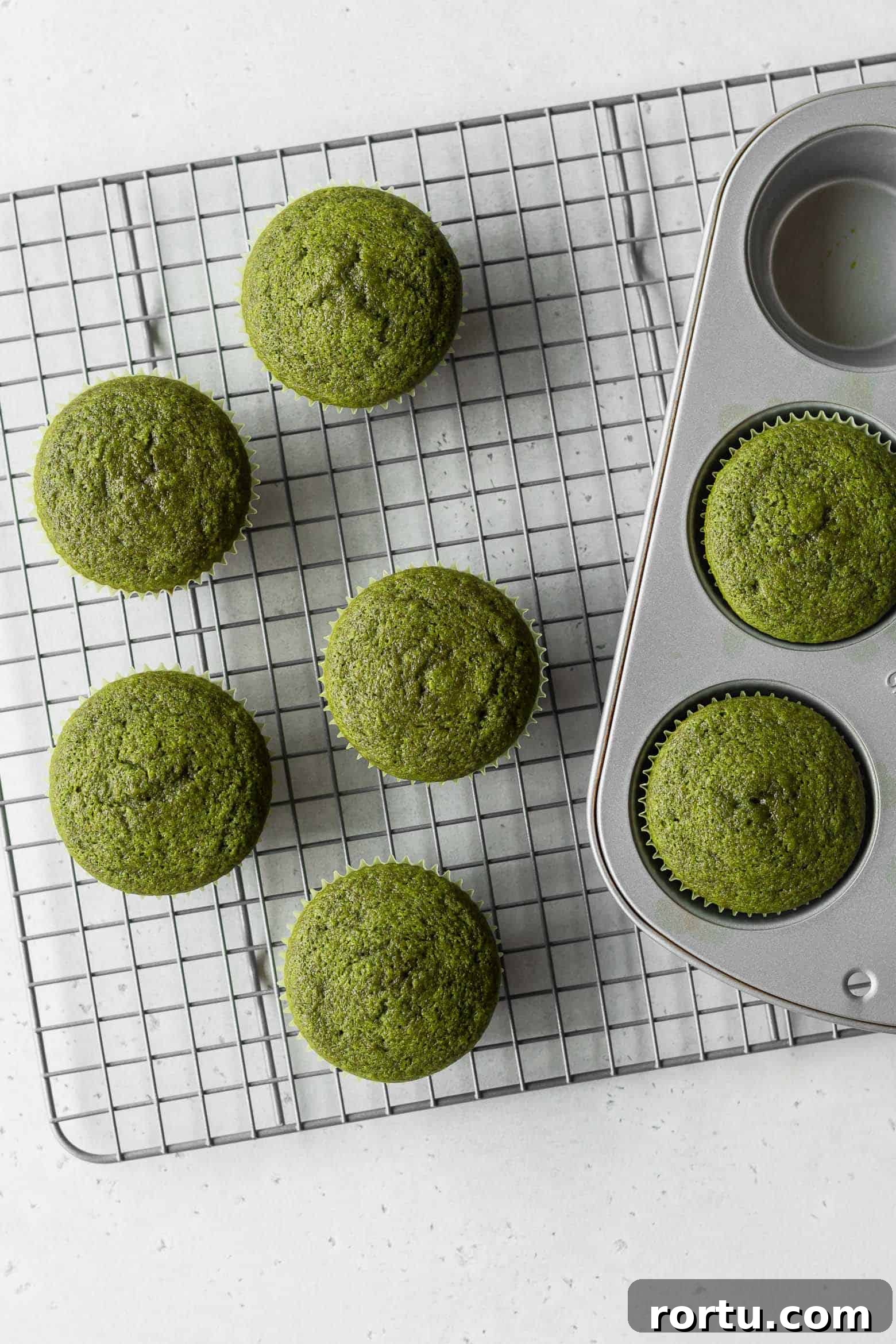 Fluffy Matcha Cupcakes: How to Make Moist Green Tea Cupcakes (Video) 7 Take the cupcakes onto a wire rack to cool