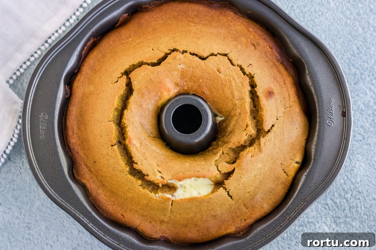Pumpkin Cream Cheese Pound Cake fresh out of the oven in a bundt pan. 