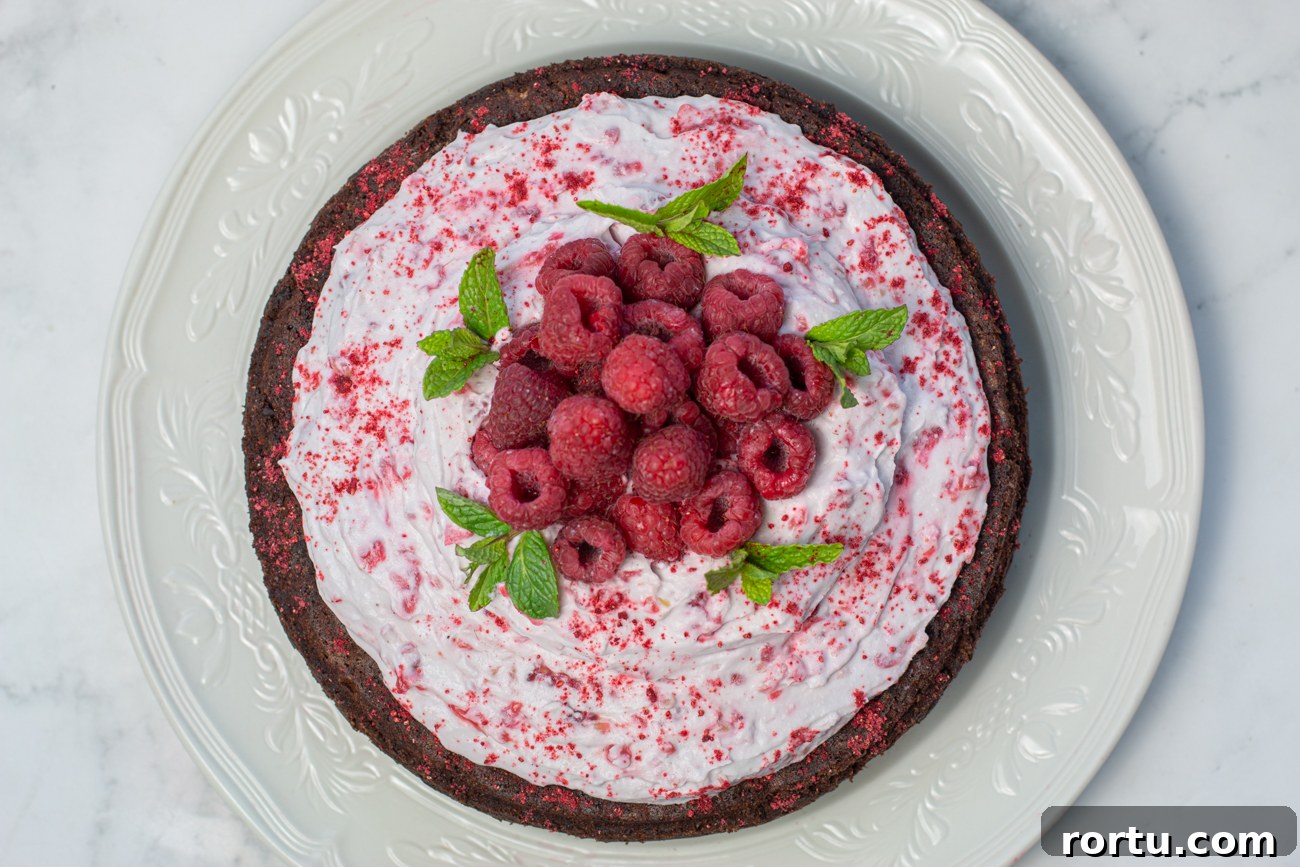 Flourless Chocolate Mousse Cake with Raspberry Coconut Whipped Cream 3 Flourless Chocolate Mousse Cake with Crushed Raspberry Coconut Whipped Cream