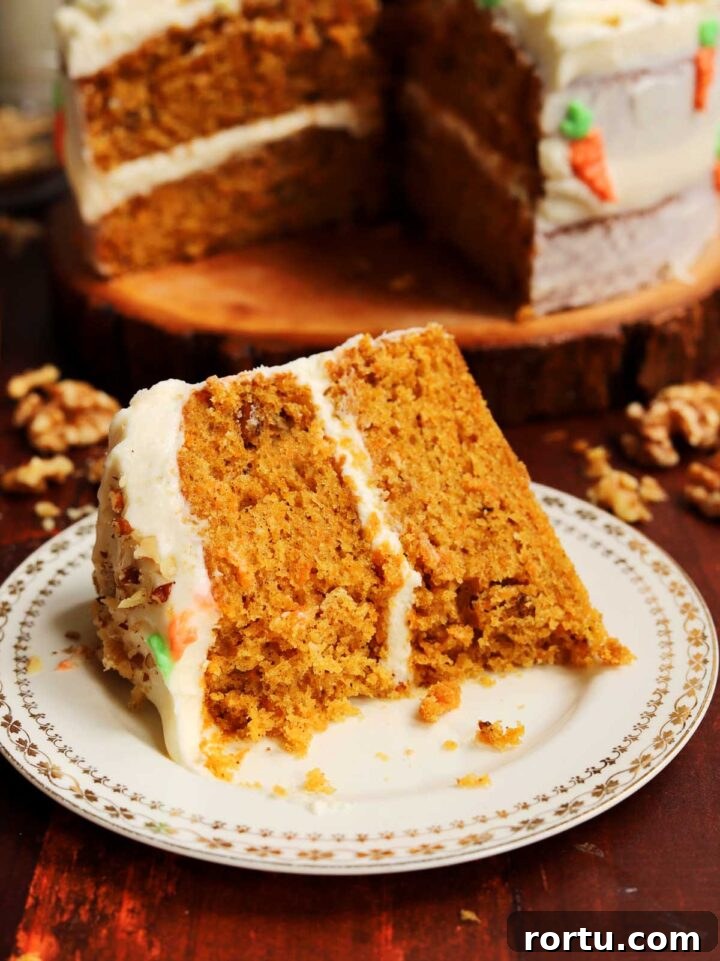 Ultimate Carrot Cake with Light Fluffy Cream Cheese Frosting 17 best carrot cake slice with bite