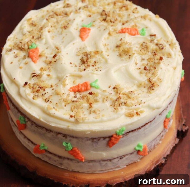 Ultimate Carrot Cake with Light Fluffy Cream Cheese Frosting 19 best carrot cake with best cream cheese frosting on a board