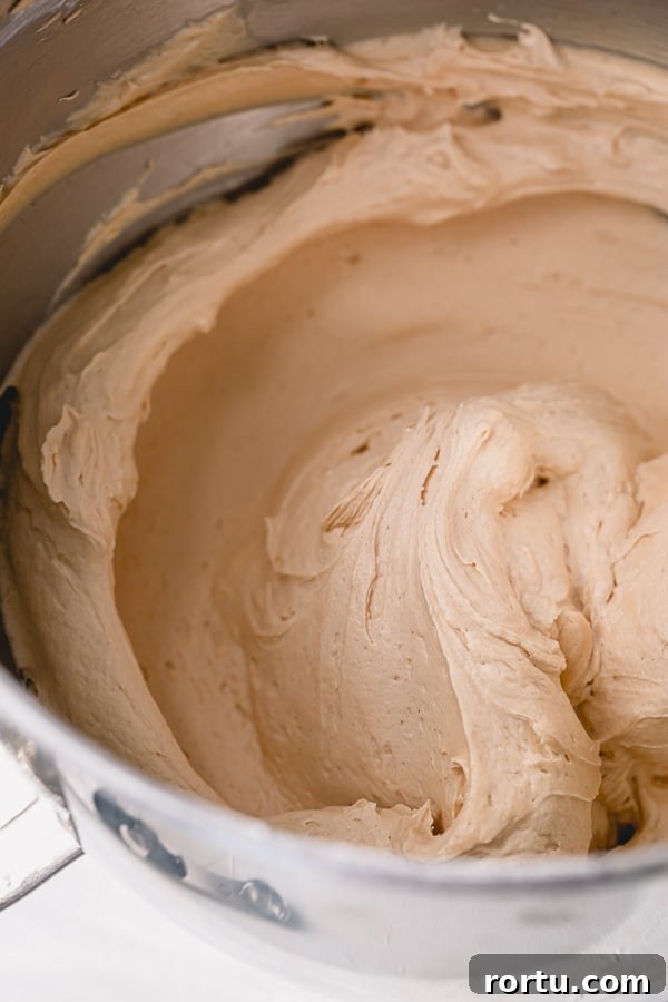 Peanut Butter Buttercream Frosting Recipe for Smooth, Spreadable Icing 3 Seriously addicting peanut butter buttercream frosting - insanely delicious paired with chocolate cake, or cupcake, or brownies!! Learn the secret to light and fluffy peanut frosting you'll ever taste.
