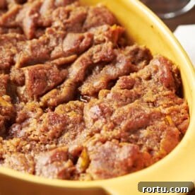Yellow dish of Sweet Potato Casserole.