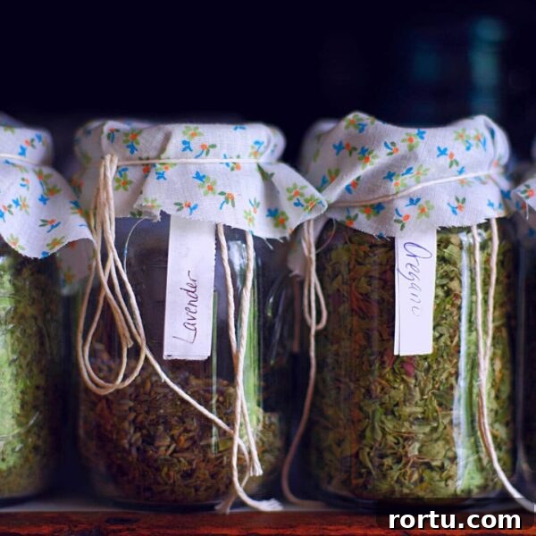 pretty herb jars with cloth and yarn and labels