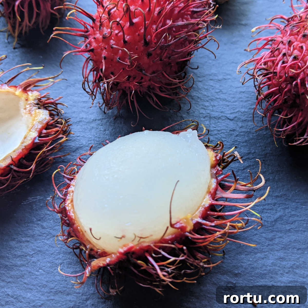 Spooky Halloween Monster Snack Ideas for Party Guests 5 inside rambutan fruit