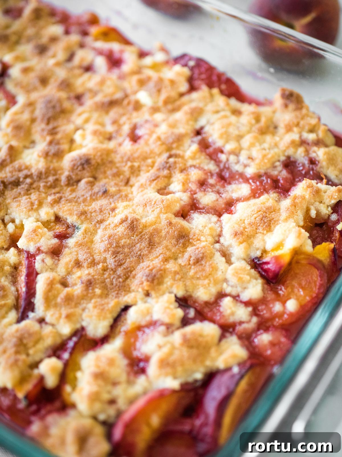 peach cobbler in a baking dish