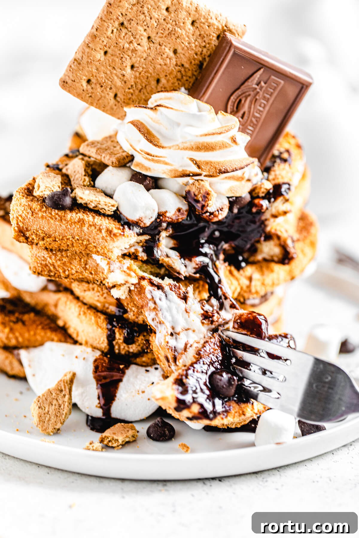 stack of s'mores flavoured French toast with a piece taken out