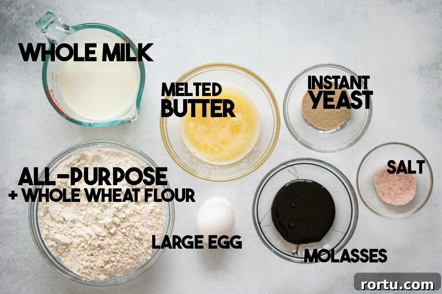 Quick Whole-Wheat Dinner Rolls That Rise Perfectly 3 Ingredients used in the recipe, separated into glass bowls.
