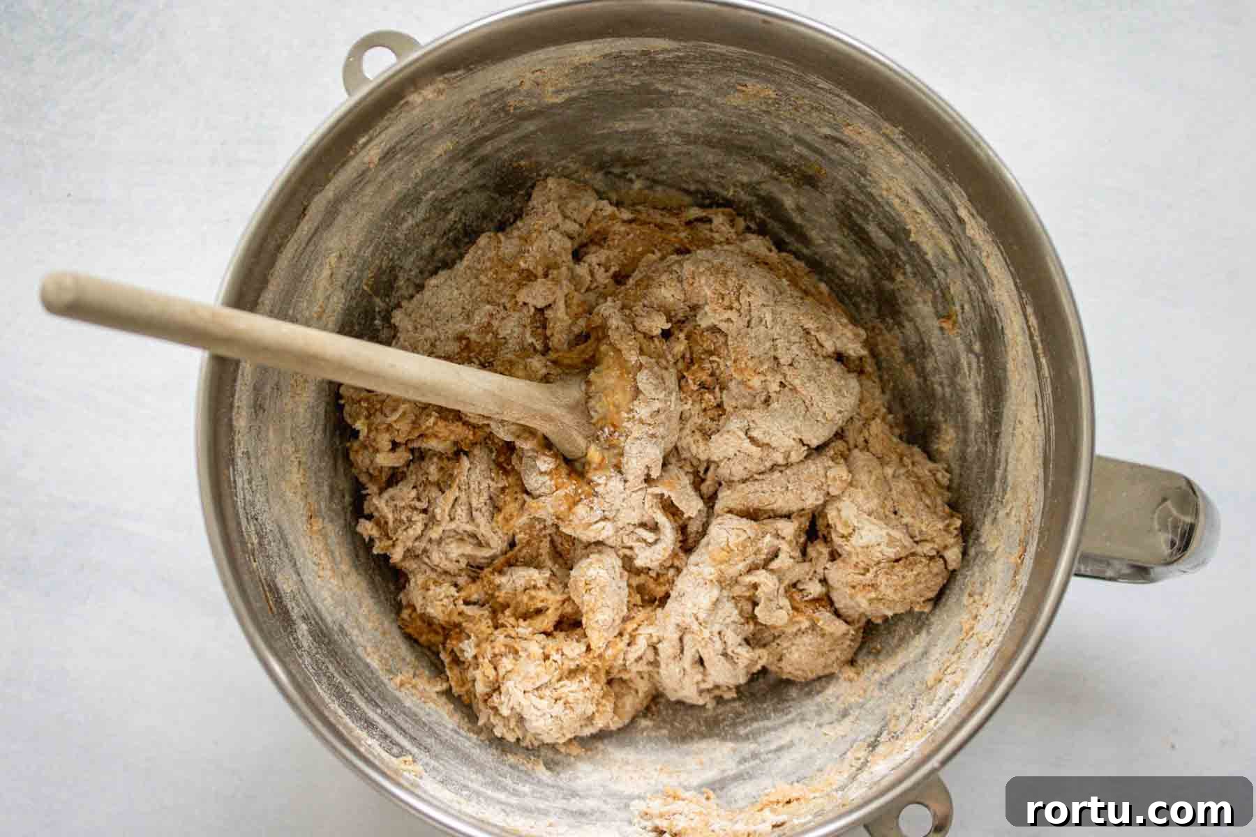Quick Whole-Wheat Dinner Rolls That Rise Perfectly 5 All ingredients mixed into a metal bowl.
