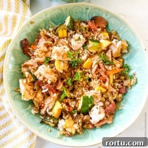 a green bowl of Blackstone Chicken Fried Rice.