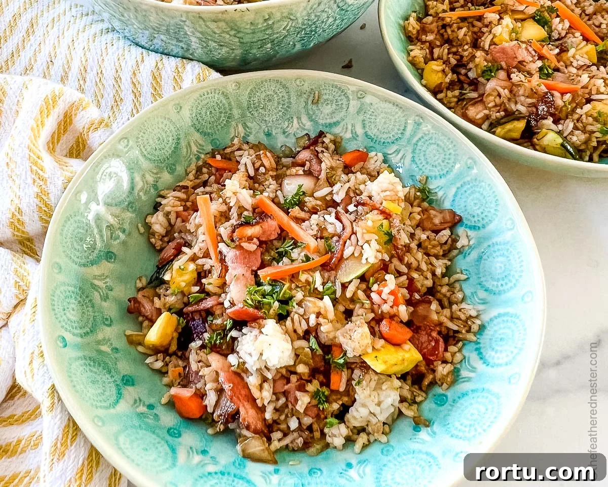 green bowls of fried rice with chicken.