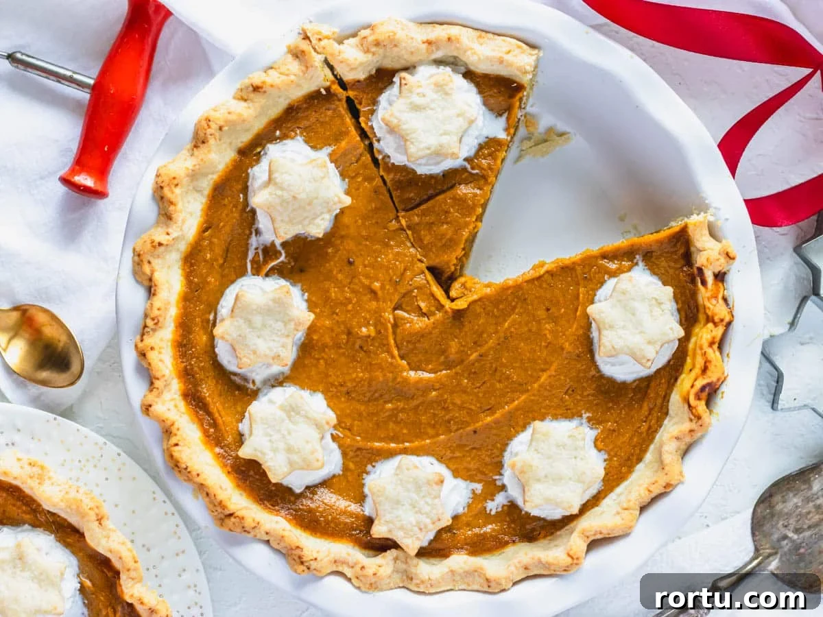 Vegan pumpkin pie with whipped cream