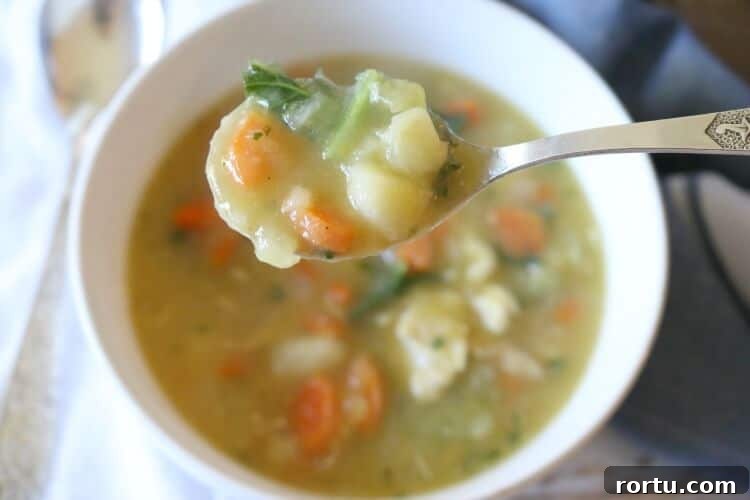 Nourishing Pastured Chicken Stew - Lightly creamy and fully flavorful, this chicken stew boasts nutrition from bone broth, hearty veggies and squash puree. Gluten Free & Whole 30