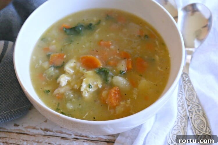 Nourishing Pastured Chicken Stew - Lightly creamy and fully flavorful, this chicken stew boasts nutrition from bone broth, hearty veggies and squash puree. Gluten Free & Whole 30
