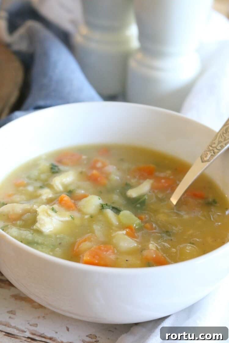 Nourishing Pastured Chicken Stew - Lightly creamy and fully flavorful, this chicken stew boasts nutrition from bone broth, hearty veggies and squash puree. Gluten Free & Whole 30