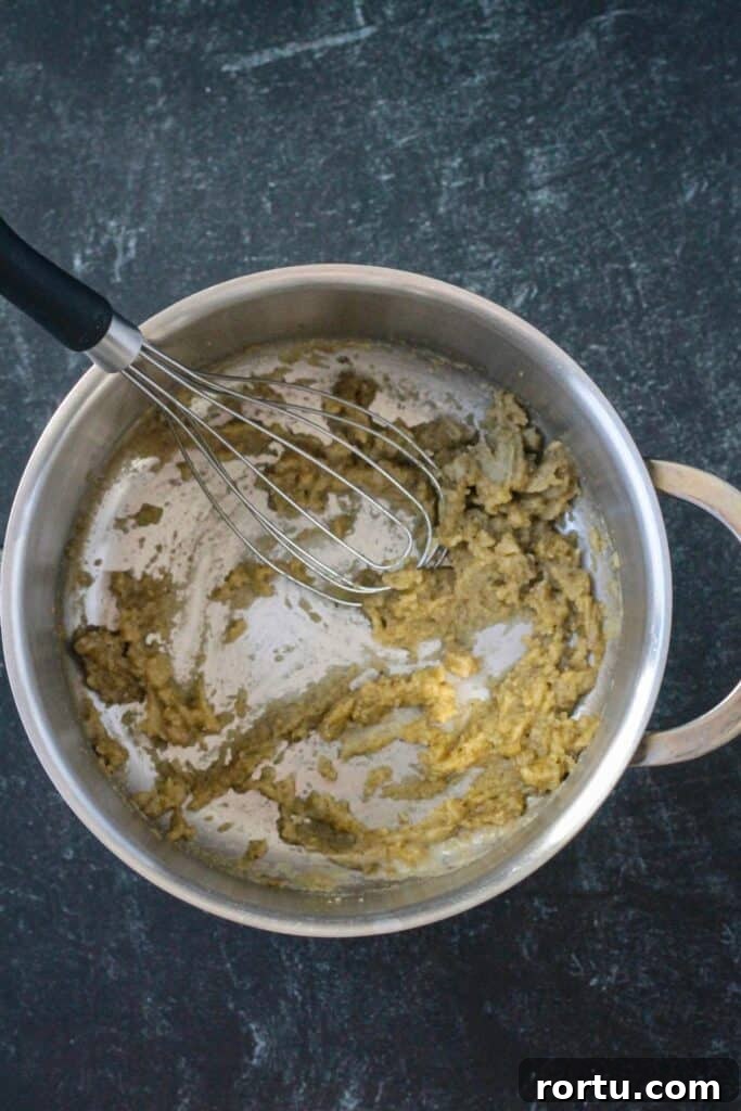 Spices and herbs added to the roux.