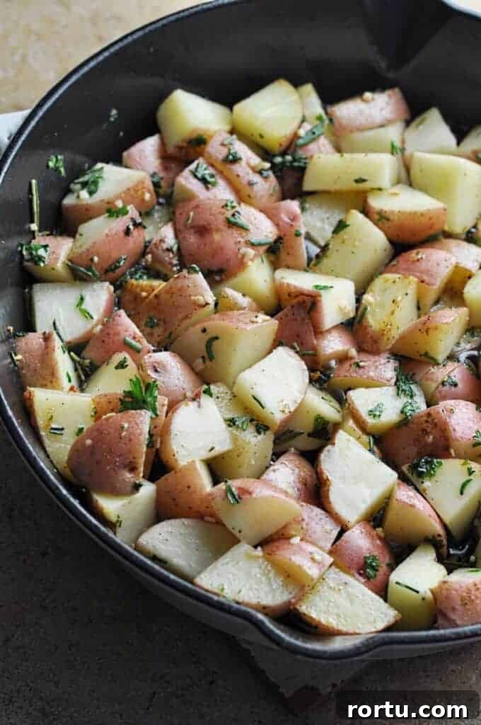 Potatoes chopped cooking in pan