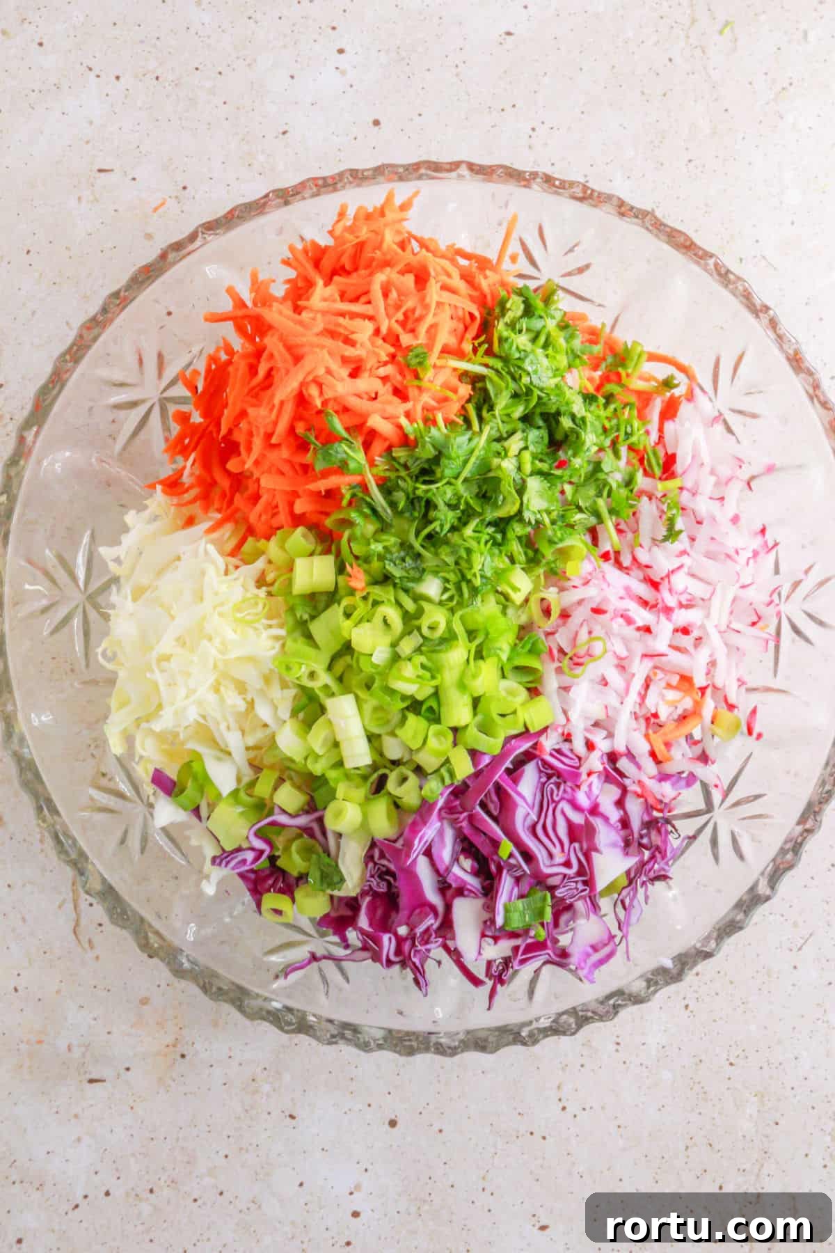 Coleslaw vegetables in a mixing bowl
