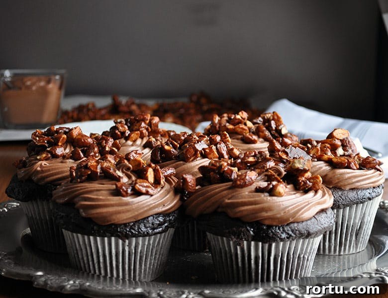 Best chocolate cupcake recipe | ultra moist chocolate cupcake recipe with amaretto pastry cream and almond pralines | ofbatteranddough.com