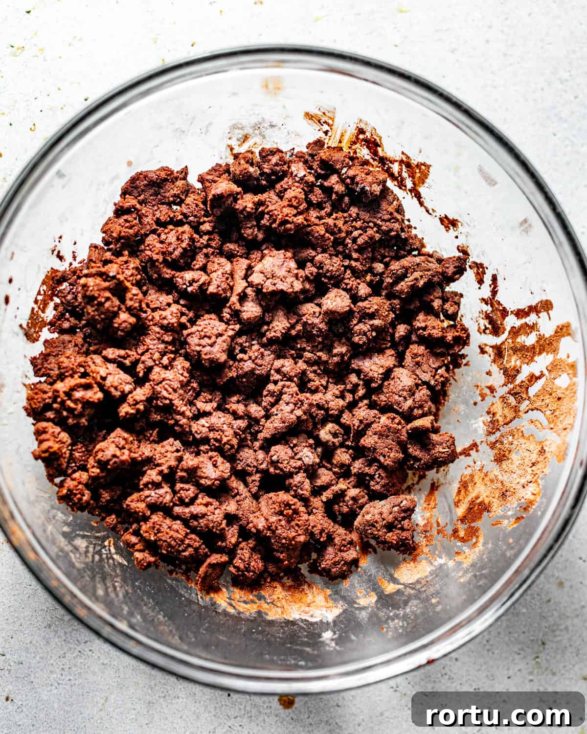 chocolate crumble topping mixed together in a bowl. 