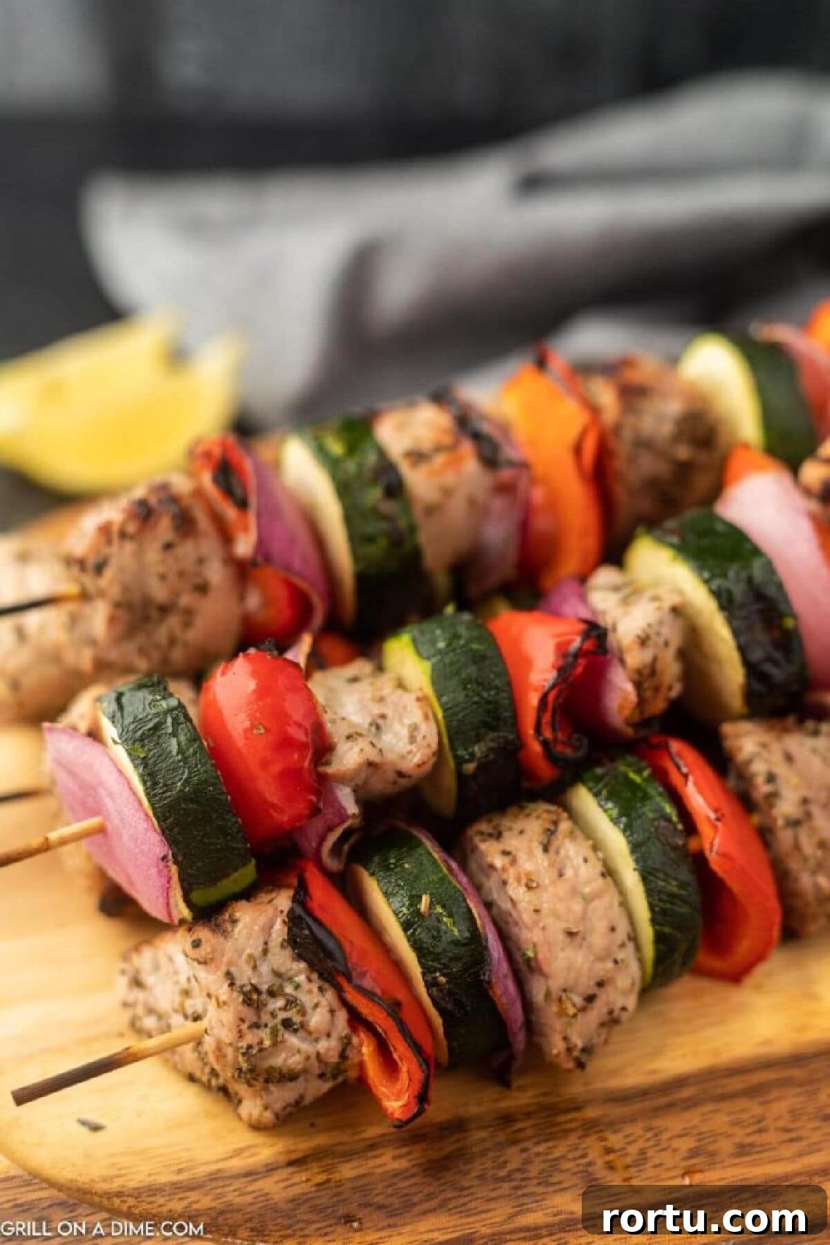 Grilled Pork Kabobs on a platter.