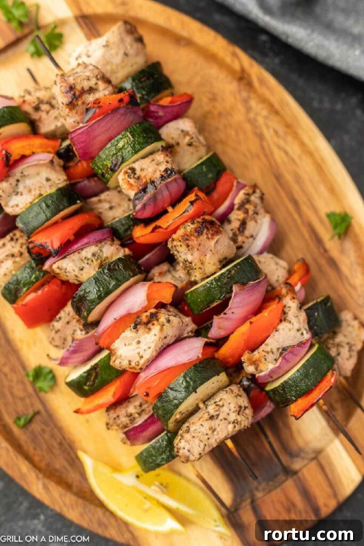 Grilled Pork Kabobs on a platter.