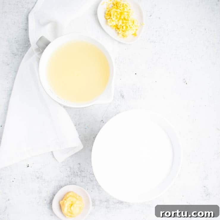 Refreshing Lemon Ginger Sorbet Recipe for Summer Desserts 3 ingredients against a gray background.