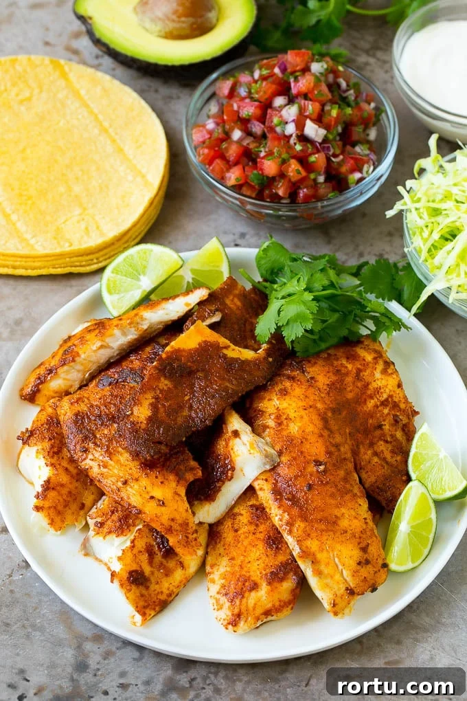 Cooked fish with toppings Cooked fish, cabbage, pico de gallo and corn tortillas.