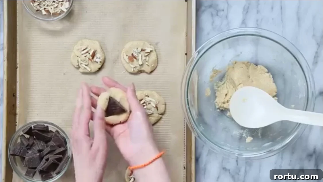 Gluten-Free Vegan Almond Joy Cookies Recipe 11 Vegan almond joy cookie dough on parchment lined baking sheet
